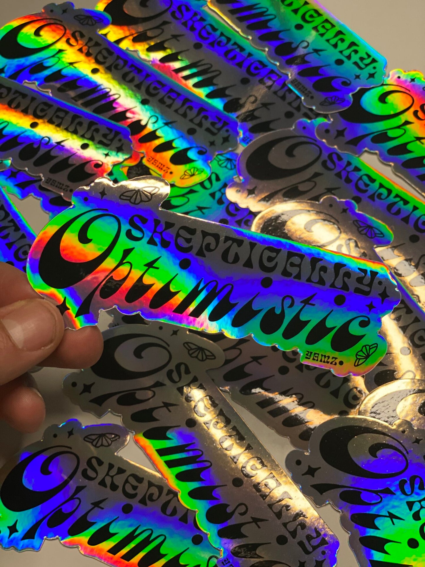 Skeptically Optimistic Holographic Sticker